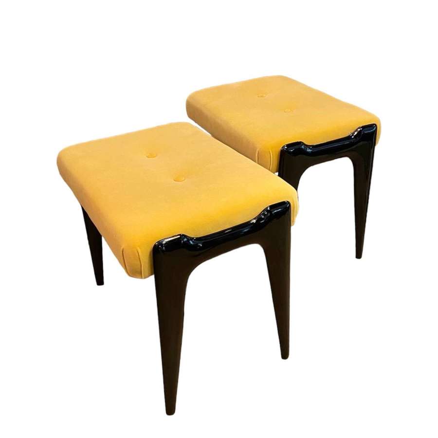 A pair of 1950's Italian stools, yellow velour, ebonized wooden legs